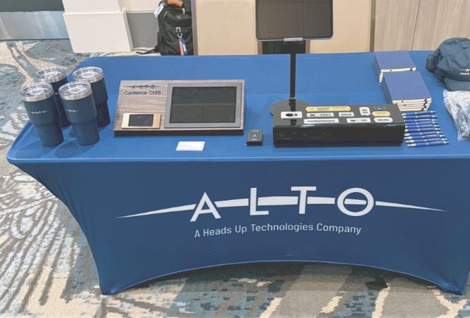 ALTO Aviation tabletop display showcasing Cadence CMS touchscreen and cabin control panels at the Embraer Operators Association Conference